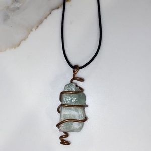 Fluorite crystal with copper necklace